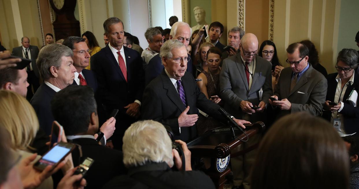 Senate Majority Leader Mitch McConnell (R-Ky.), center, tells the press Tuesday at the Capitol that he is confident Republicans "are going to win" the confirmation of Brett Kavanaugh to the Supreme Court. (Photo: Win McNamee via Getty Images)