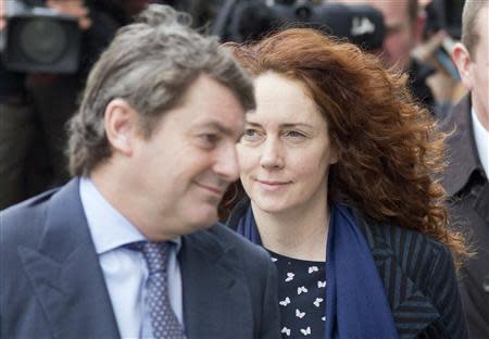 Former News International chief executive Rebekah Brooks and her husband Charlie Brooks arrive at the Old Bailey courthouse in London February 19, 2014. REUTERS/Neil Hall