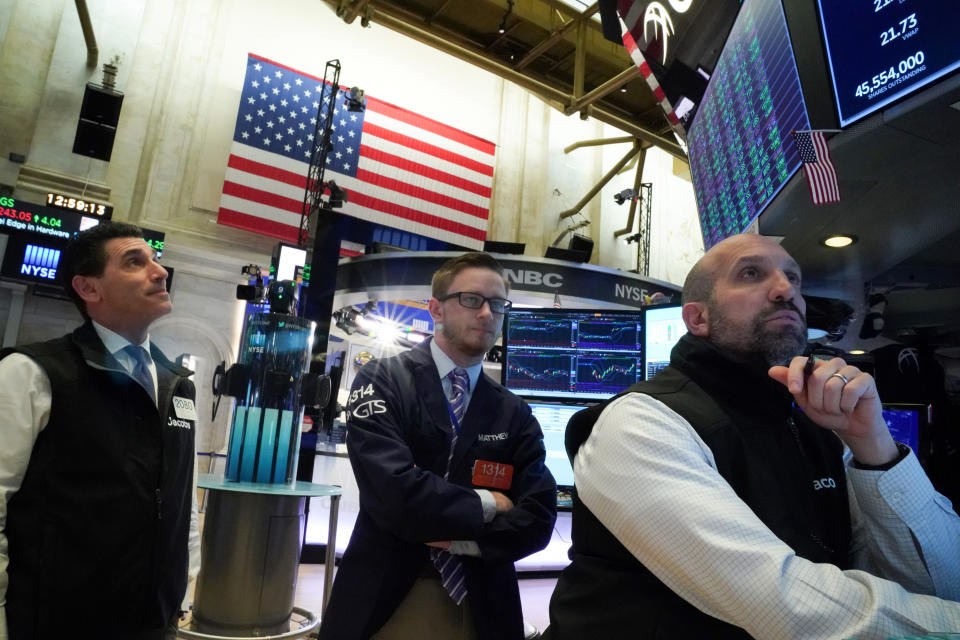 Traders work at the New York Stock Exchange (NYSE) in New York, U.S., February 4, 2020. REUTERS/Bryan R Smith