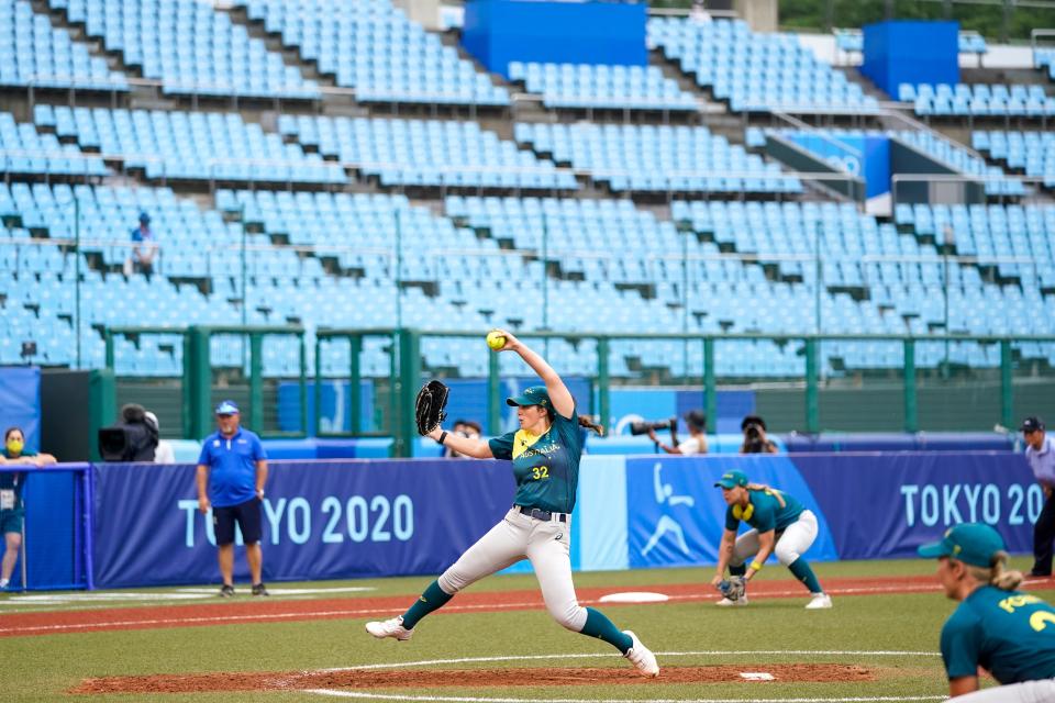 Australia and Italy play on the converted softball field at Fukishima Azoma Stadium on Thursday