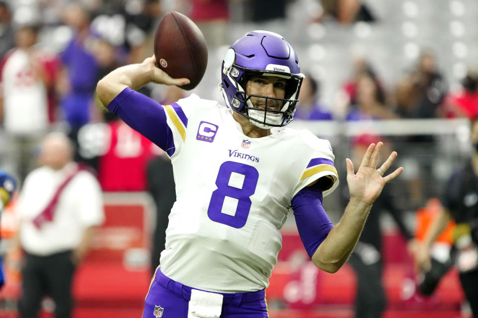 Minnesota Vikings quarterback Kirk Cousins (8) warms up prior to an NFL football game against the Arizona Cardinals, Sunday, Sept. 19, 2021, in Glendale, Ariz. (AP Photo/Rick Scuteri)