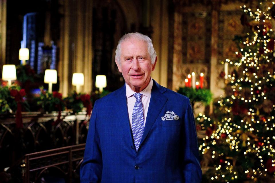 Britain's King Charles III delivers his message during the recording of his first Christmas broadcast in the Quire of St George's Chapel at Windsor Castle, Berkshire, England, Tuesday, Dec. 13, 2022. King Charles III evoked memories of his late mother, Queen Elizabeth II, as he broadcast his first Christmas message as monarch on Sunday, Dec. 25, 2022.