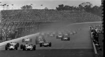 FILE - In this May 30, 1967, file photo, Mario Andretti (1) leads the field at the start of the 51st running of the Indianapolis 500 at Indianapolis Motor Speedway in Indianapolis. The race had to be stopped for rain, and was restarted the following day. Gordon Johncock (3), far left, and A.J. Foyt (14), center, the eventual race winner, also compete. When it came to deciding the greatest rivalry, Foyt, Andretti and Bobby Unser received the most attention. 1986 winner Bobby Rahal says "the greatest rivalry had to be A.J. Foyt against anyone else." (AP Photo, File)