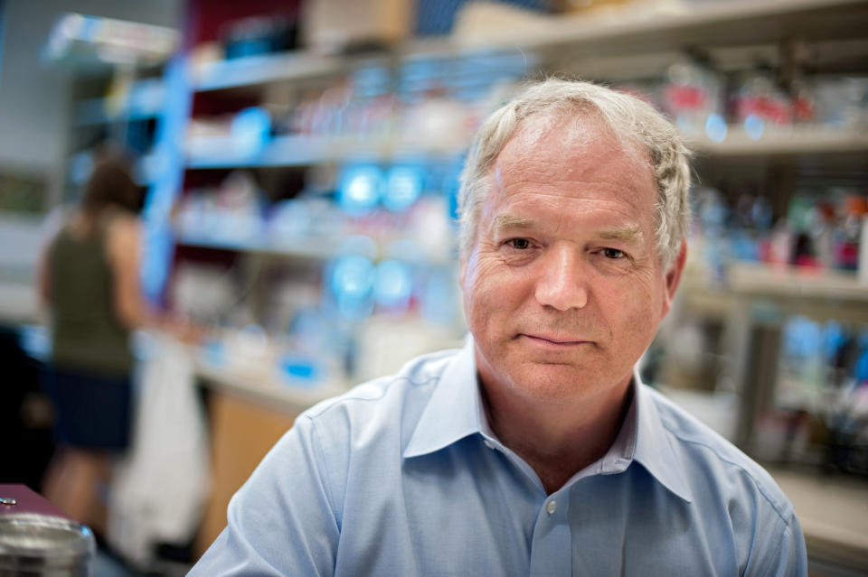 In this undated photo provided by the University of Alberta, Dr. Michael Houghton poses in his lab at Li Ka Shing Institute of Virology - University of Alberta, in Edmonton, Alberta, Canada. The British-born scientist and Americans Harvey J. Alter and Charles M. Rice jointly won the Nobel Prize for medicine on Monday, Oct. 5, 2020, for their discovery of the hepatitis C virus, a major source of liver disease that affects millions worldwide. (Richard Siemens/University of Alberta via AP)