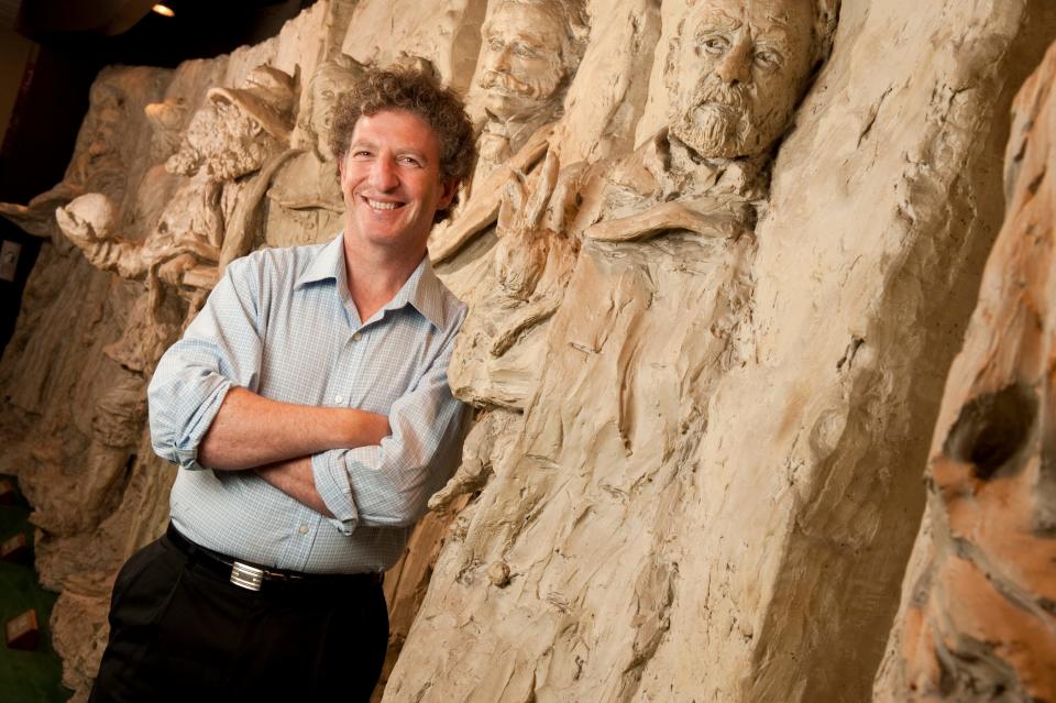 Dr. Thomas Perls, MD, MPH, Associate Professor of Medicine and Geriatrics, Boston University Medical School, standing in a sculpture of great healers on campus in Boston, MA on August 4, 2010. Dr. Perls is the founder and director of the New England Centenarian Study, the largest study of centenarians in the world.