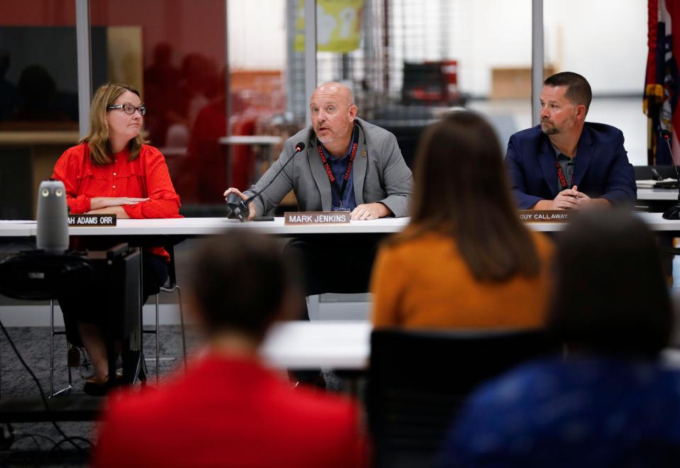 The Ozark school board vice president Mark Jenkins answers a question at a town hall meeting from its parents and community members on Tuesday, Oct. 10, 2023.