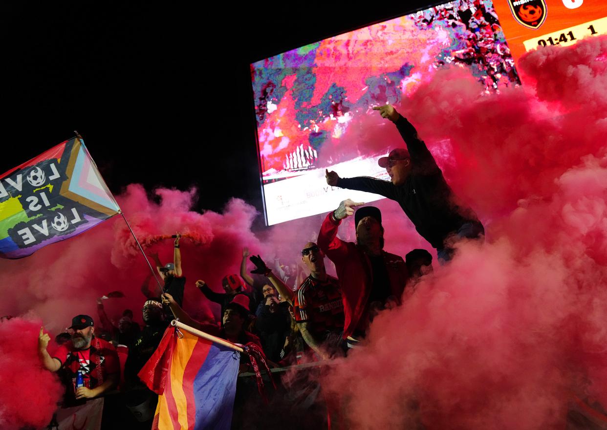 Mar. 12, 2022; Chandler, AZ, USA; Phoenix Rising fans celebrate the first goal in the second minute of the season against Monterey Bay at Phoenix Rising FC Stadium.