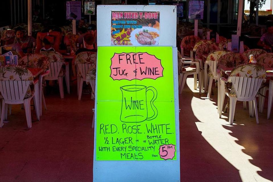 Special offers for drinks are seen at a bar at Magaluf beach (Getty Images)