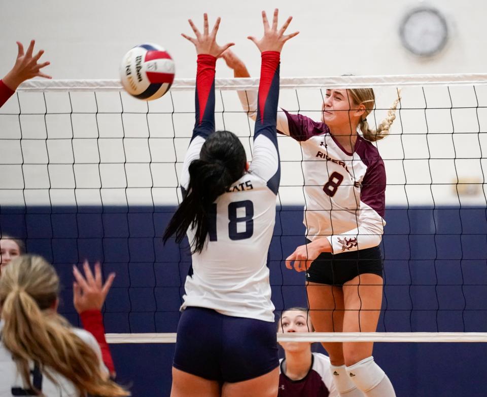 Riverdale Raiders outside hitter Olivia Znotens (8) goes for a kill during a game against the Estero Wildcats at Estero High School on Tuesday, Oct. 3, 2023.