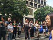 <p>Passersby gathered outside the Hawker Chan storefront ahead of its official opening. </p>