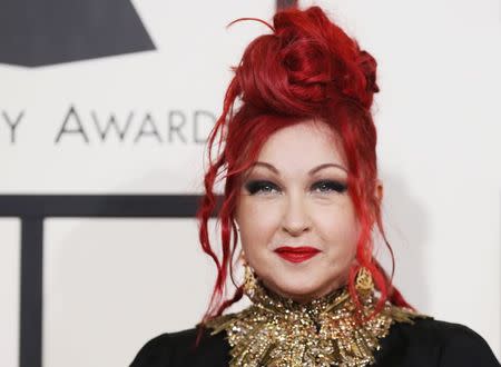 Musician Cyndi Lauper arrives at the 56th annual Grammy Awards in Los Angeles, California in this file photo taken January 26, 2014. REUTERS/Danny Moloshok