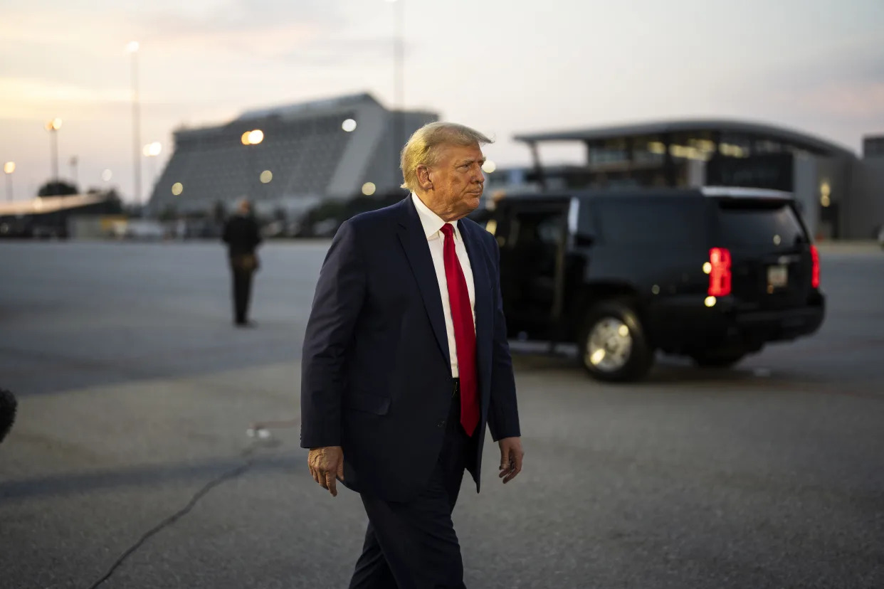 Former President Donald Trump at the airport in Atlanta, after being booked at the Fulton County Jail where he and 18 allies were charged in Georgia election meddling, on Thursday, Aug. 24, 2023. (Doug Mills/The New York Times)