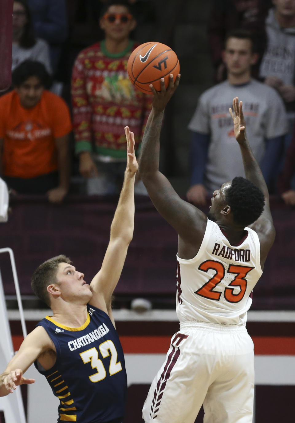 Virginia Tech's Tyrece Radford (23) shoots over Chattanooga's Matt Ryan (32) in the first half of an NCAA college basketball game, Wednesday, Dec. 11, 2019, in Blacksburg, Va. (Matt Gentry/The Roanoke Times via AP)