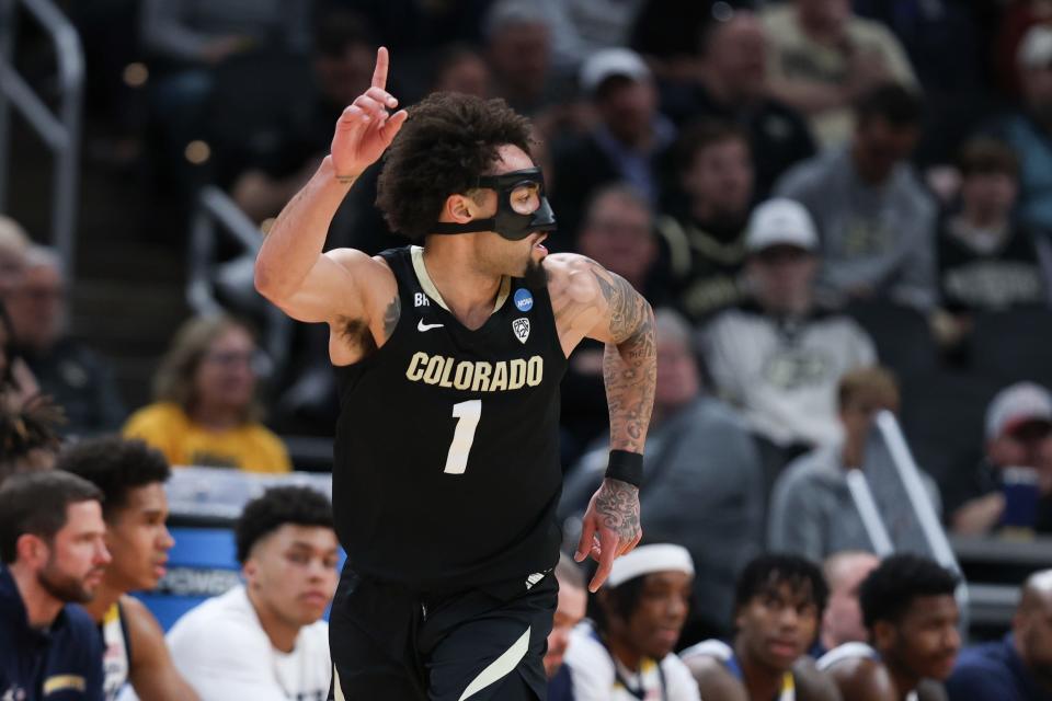 Mar 24, 2024; Indianapolis, IN, USA; Colorado Buffaloes guard J'Vonne Hadley (1) reacts after scoring against the Marquette Golden Eagles during the first half at Gainbridge FieldHouse. Mandatory Credit: Trevor Ruszkowski-USA TODAY Sports