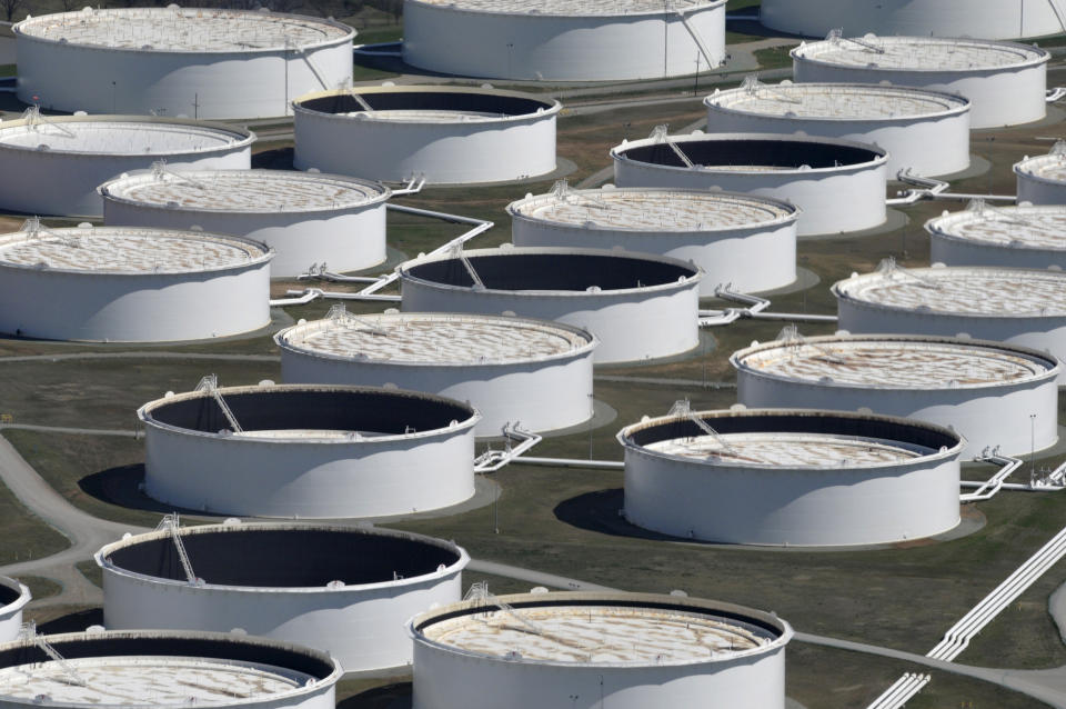 Crude oil storage tanks are seen from above at the Cushing oil hub, appearing to run out of space to contain a historic supply glut that has hammered prices, in Cushing, Oklahoma, March 24, 2016. REUTERS/Nick Oxford/File Photo