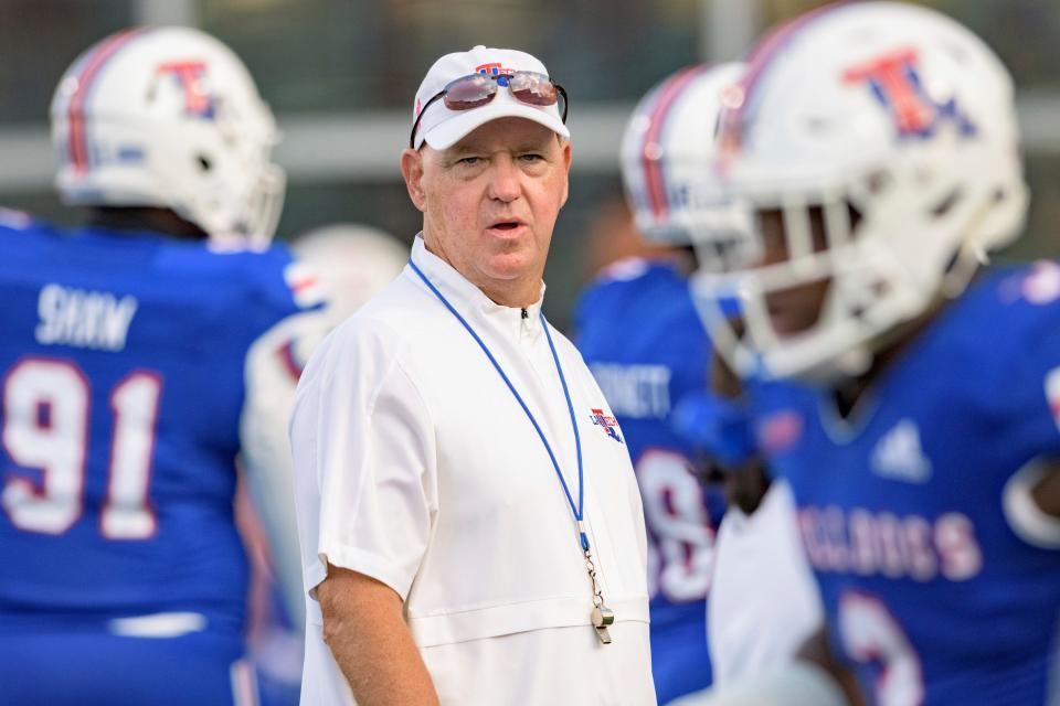 Louisiana Tech head coach Skip Holtz walks the field before an NCAA college football game against UTSA in Ruston, La., Saturday, Oct. 23, 2021. (AP Photo/Matthew Hinton)