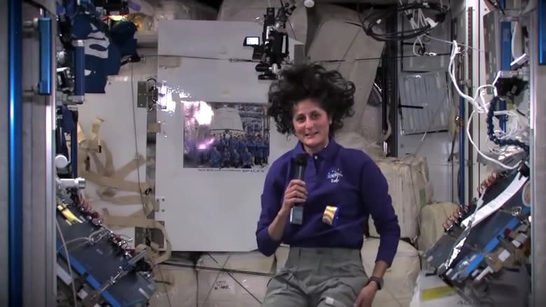 Astronaut with Blue Bell cup