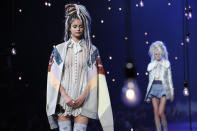 <p>For his most controversial runway hairstyle yet, models of all ethnicities wore multicolored faux dreadlocks. (Photo: AP Images) </p>