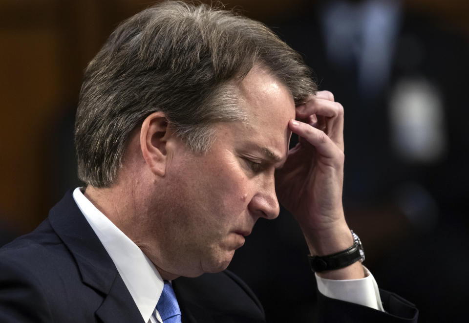 In this Sept. 6, 2018 photo, Supreme Court nominee, Brett Kavanaugh waits to testify before the Senate Judiciary Committee for the third day of his confirmation hearing, on Capitol Hill in Washington. Official Washington is scrambling Monday to assess and manage Kavanaugh’s prospects after his accuser, Christine Blasey Ford, revealed her identity to The Washington Post and described an encounter she believes was attempted rape. Kavanaugh reported to the White House amid the upheaval, but there was no immediate word on why or whether he had been summoned. (AP Photo/J. Scott Applewhite)