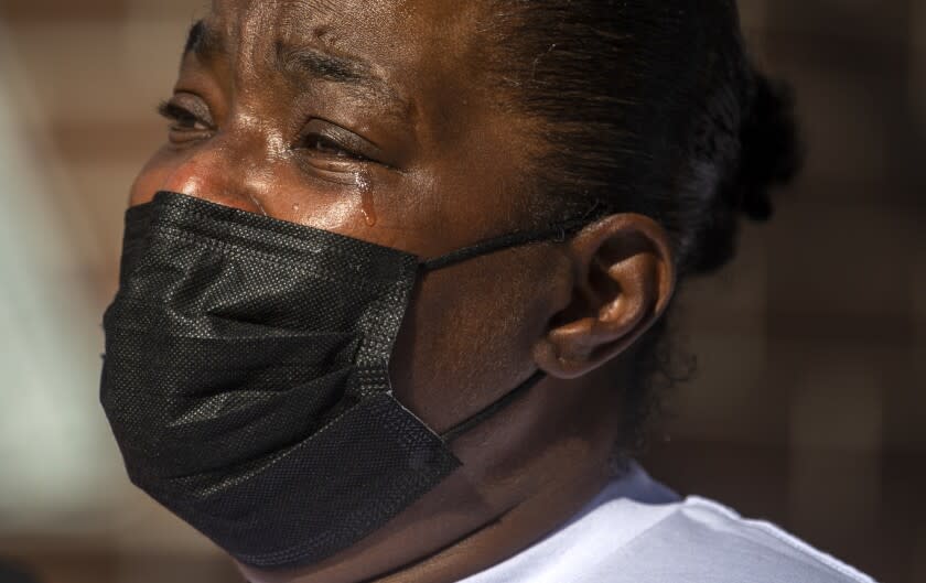 LOS ANGELES, CA - JANUARY 20: Barbara Pritchett, 56, cries during press conference on Thursday, Jan. 20, 2022 in Los Angeles, CA. During the press conference it was announced there is now a $50,000 reward for information leading to the arrest and conviction of the suspect(s) who Murdered DeAndre Hughes, on July 17, 2016 around 7:30 pm in front of 939 E. 120th, Los Angeles,CA. Barbara Pritchett, DeAndre Hughes' mother said "this is my 2nd child murdered in Watts in 3 years." (Francine Orr / Los Angeles Times)