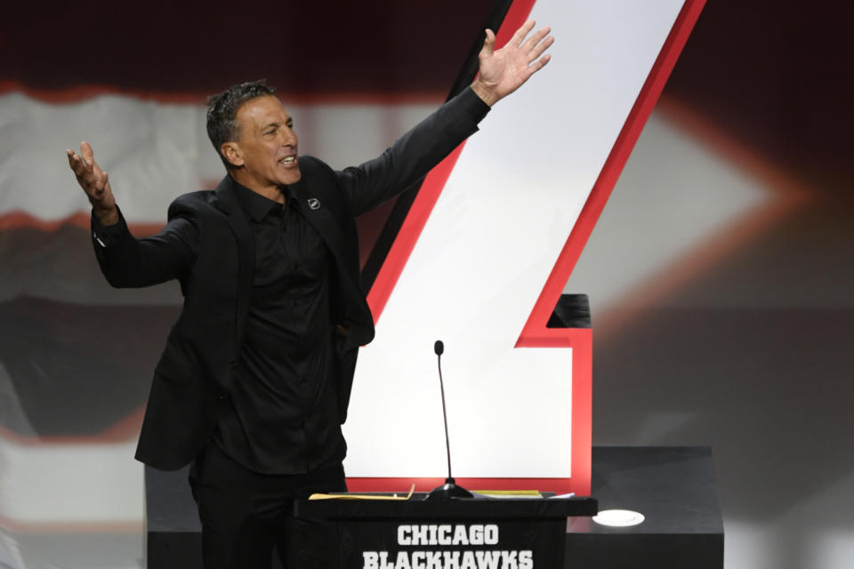 Former Chicago Blackhawks great Chris Chelios has his jersey retired during a ceremony before an NHL hockey game between the Chicago Blackhawks and Detroit Red Wings Sunday, Feb. 25, 2024, in Chicago. (AP Photo/Paul Beaty)