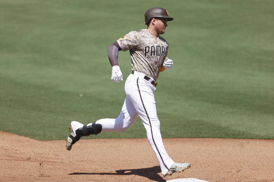 San Diego Padres' Luke Voit runs the bases after hitting a solo home run against the Colorado Rockies during the fifth inning of a baseball game Sunday, June 12, 2022, in San Diego. (AP Photo/Mike McGinnis)