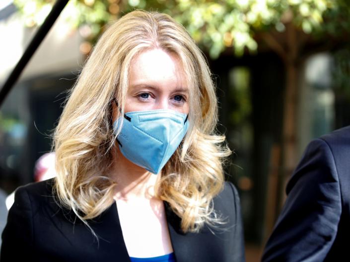 Theranos founder Elizabeth Holmes leaves after attending her fraud trial at federal court in San Jose, California, U.S. November 22, 2021
