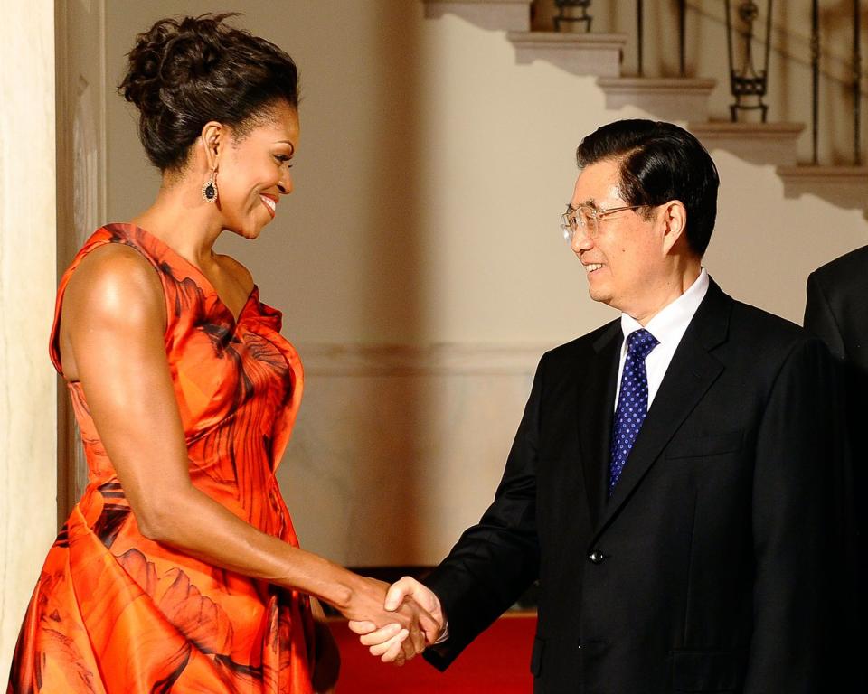 Shaking hands with then-President of China Hu Jintao at the White House in 2011