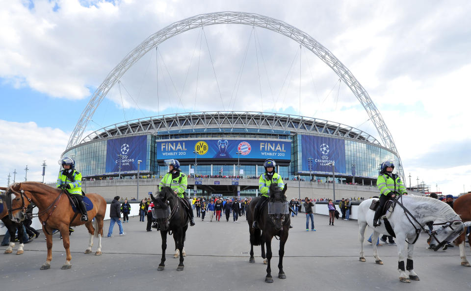 Police horses outside Wembley Stadium before the UEFA Champions League Final at Wembley Stadium, London.