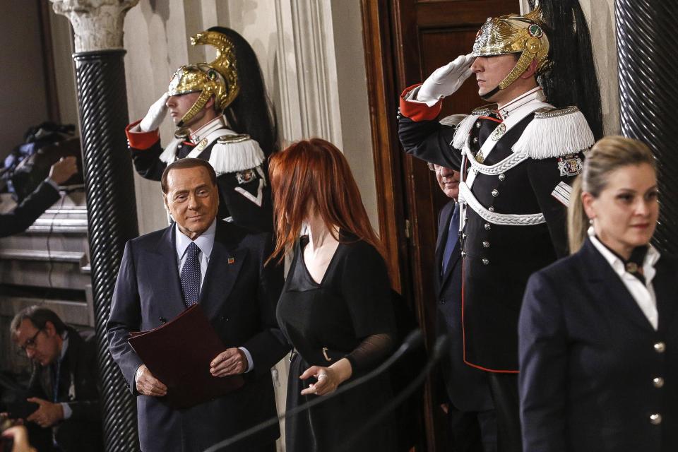 Italian former Premier Silvio Berlusconi arrives after meeting President Sergio Mattarella, at the Quirinale Palace in Rome, Saturday, Dec. 10, 2016. Italian President Sergio Mattarella, as head of state, has been opening formal consultations as he weighs who should get the mandate to try to form a new government. (Giuseppe Lami/ANSA via AP)