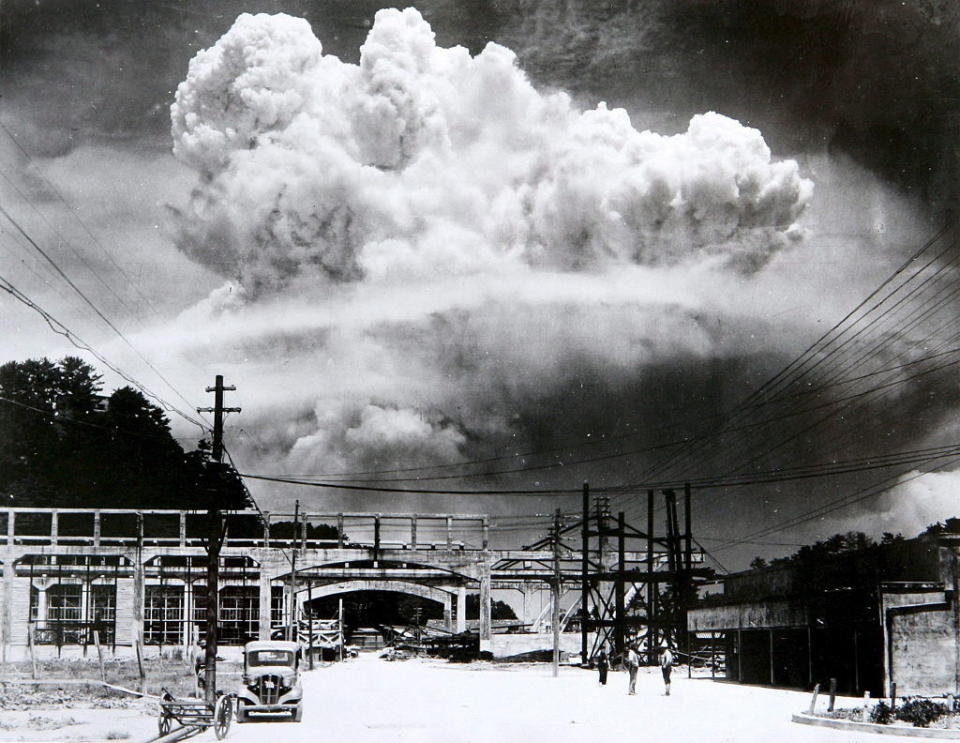 A huge cloud appears above a cityscape