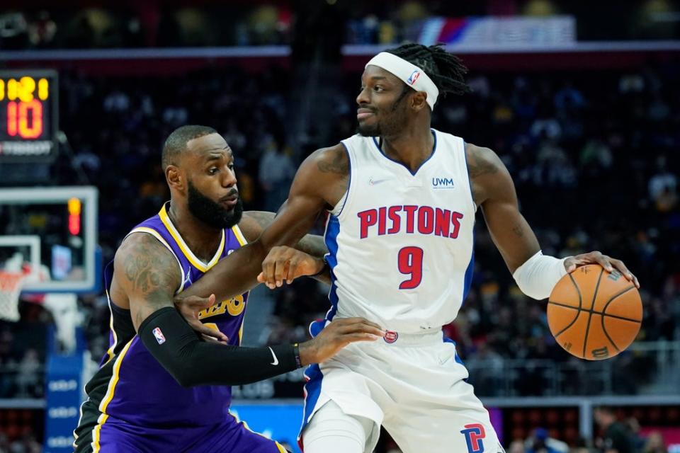 LeBron James, left, in action (Carlos Osorio/AP) (AP)