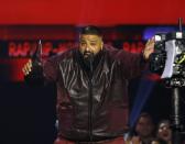 2017 American Music Awards – Show – Los Angeles, California, U.S., 19/11/2017 – DJ Khaled accepts the award for Favorite Song - Rap/Hip-Hop for "I'm the One." REUTERS/Mario Anzuoni