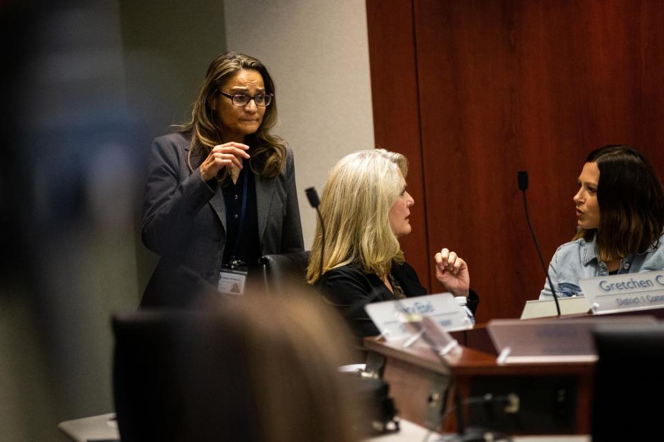 Commissioner Lucy Ebel takes her seat during the Board of Commissioners meeting Tuesday, Sept. 26, 2023, at the county offices in West Olive.