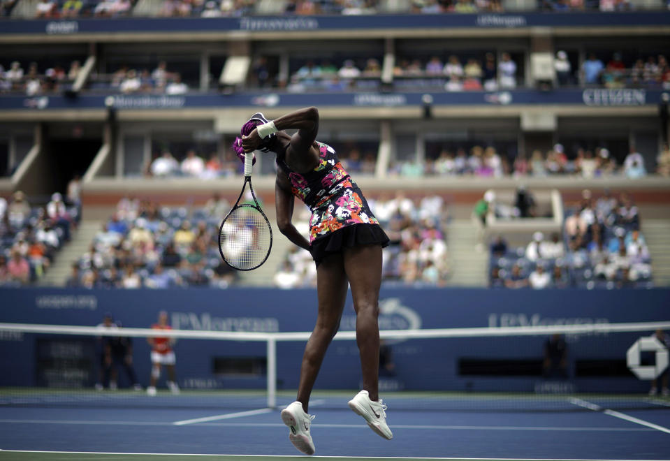 <p>Venus Williams serves to Belgium’s Kirsten Flipkens during the first round of the 2013 U.S. Open tennis tournament, Aug. 26, 2013, in New York. Williams defeated Flipkens. (AP Photo/David Goldman) </p>