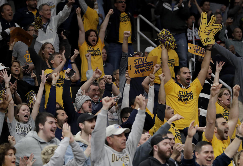 UC Irvine fans cheer during the second half a first-round game against Kansas State in the NCAA men’s college basketball tournament Friday, March 22, 2019, in San Jose, Calif. (AP Photo/Chris Carlson)