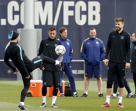 Football Soccer - Barcelona training - Champions League - Joan Gamper training camp - Barcelona, Spain - 15/3/16. Barcelona's Javier Mascherano, Neymar and Gerard Pique attend a training session. REUTERS/Albert Gea