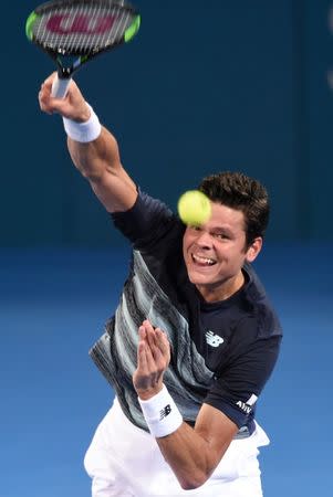 Tennis - Brisbane International - Pat Rafter Arena, Brisbane, Australia - 6/1/17 - Canada's Milos Raonic serves during his match against Spain's Rafael Nadal. REUTERS/Steve Holland