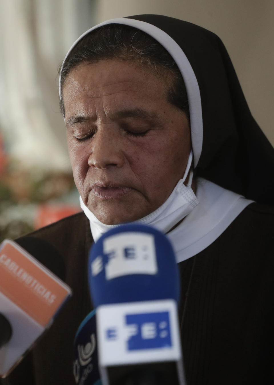 FILE — Colombian nun Gloria Cecilia Narvaez, who was held captive for nearly five years by al-Qaida-linked militants, attends a press conference in Bogota, Colombia, in this Friday, Nov. 19, 2021 file photo. Pope Francis authorized spending up to 1 million euro to free Narvaez, Cardinal Angelo Becciu testified at the Vatican's big financial fraud trial Thursday, May 5, 2022, revealing previously top secret negotiations that Francis authorized to hire a British security and intelligence firm to find the nun and pay for her liberation. (AP Photo/Ivan Valencia)