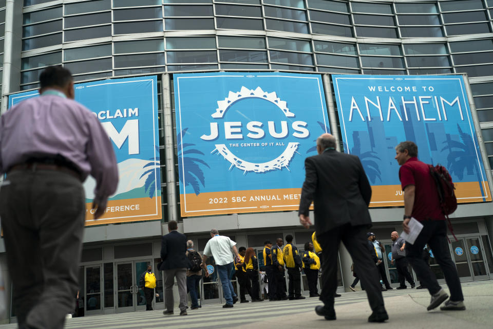 Attendees arrive at the Southern Baptist Convention's annual meeting in Anaheim, Calif., Tuesday, June 14, 2022. (AP Photo/Jae C. Hong)