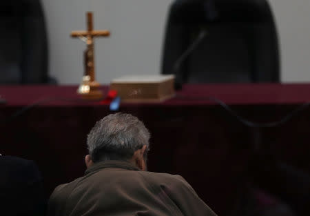 Shining Path founder Abimael Guzman attends a trial during sentence of a 1992 Shining Path car bomb case in Miraflores, at a high security naval prison in Callao, Peru September 11, 2018. REUTERS/Mariana Bazo