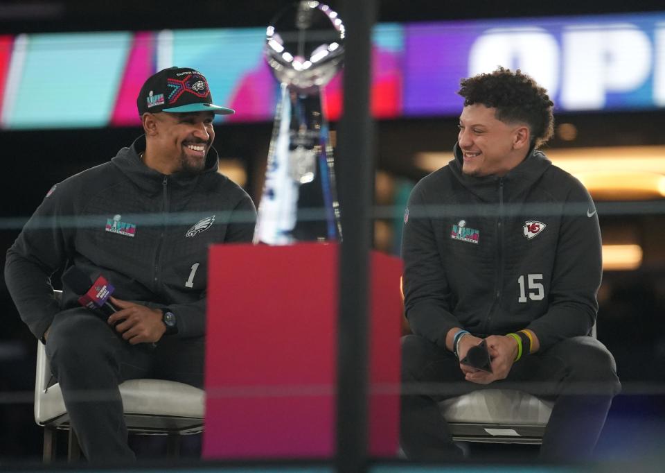 Philadelphia Eagles quarterback Jalen Hurts, left, and Kansas City Chiefs quarterback Patrick Mahomes will be the focus of attention when Super Bowl 57 kicks off Sunday evening.