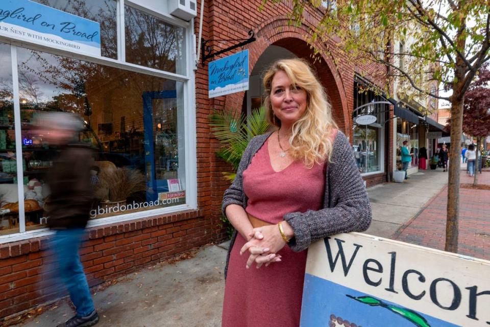 Sundi McLaughlin, owner of Mockingbird on Board, photographed on Wednesday, November 22, 2023 in Southern Pines, N.C.  McLaughlin’s shop was closed for four days in December, 2022 during the traditionally busy Christmas shopping season, after two Duke Energy substations in Moore County were damaged by gun fire.   