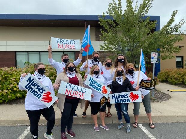 NSNU members rallied in front of the union's headquarters in Halifax on Friday morning. (Dave Laughlin/CBC - image credit)