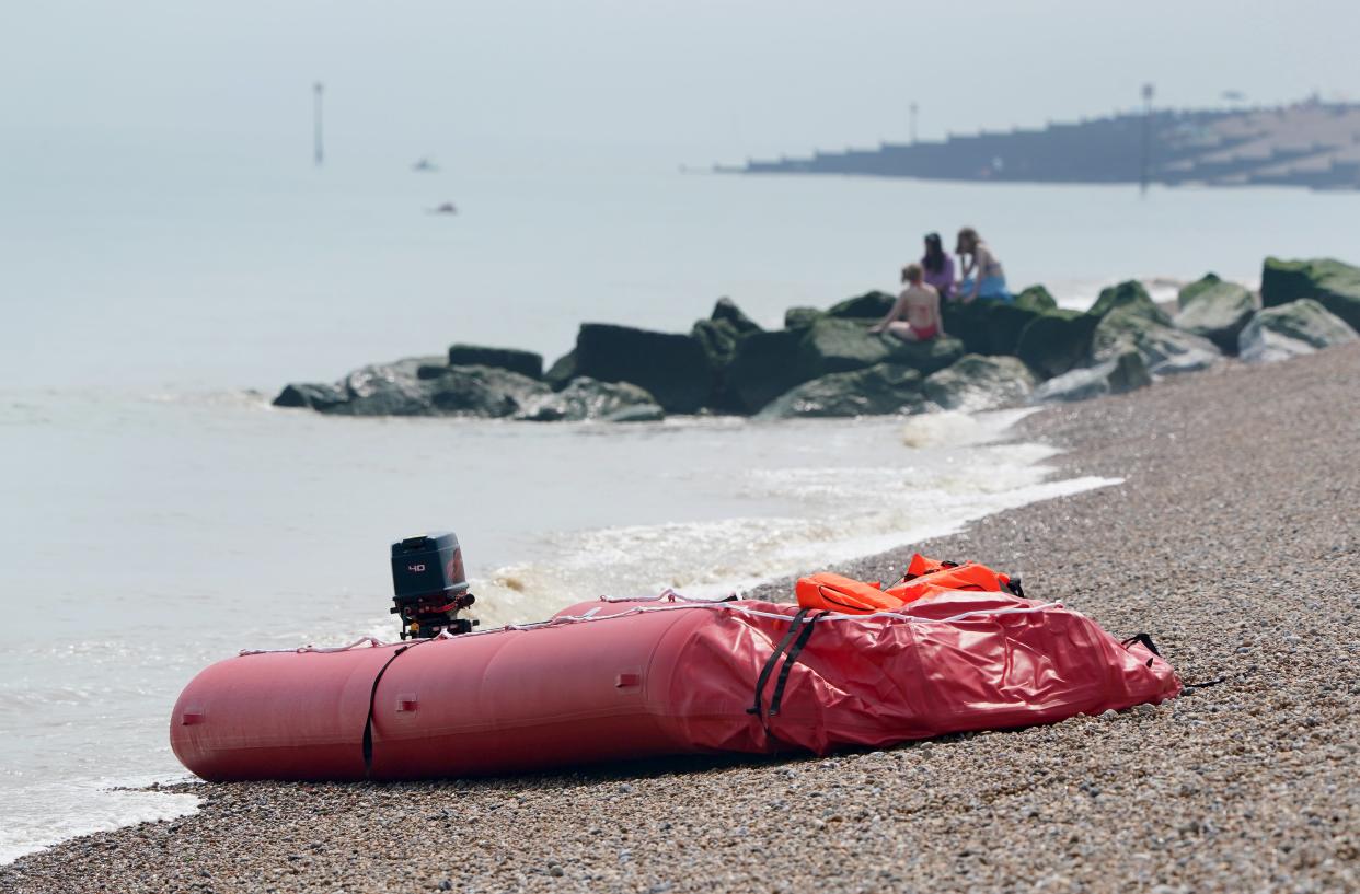 A boat thought to be used in a migrant crossing is left on the beach in Walmer, Kent (Gareth Fuller/PA) (PA Wire)