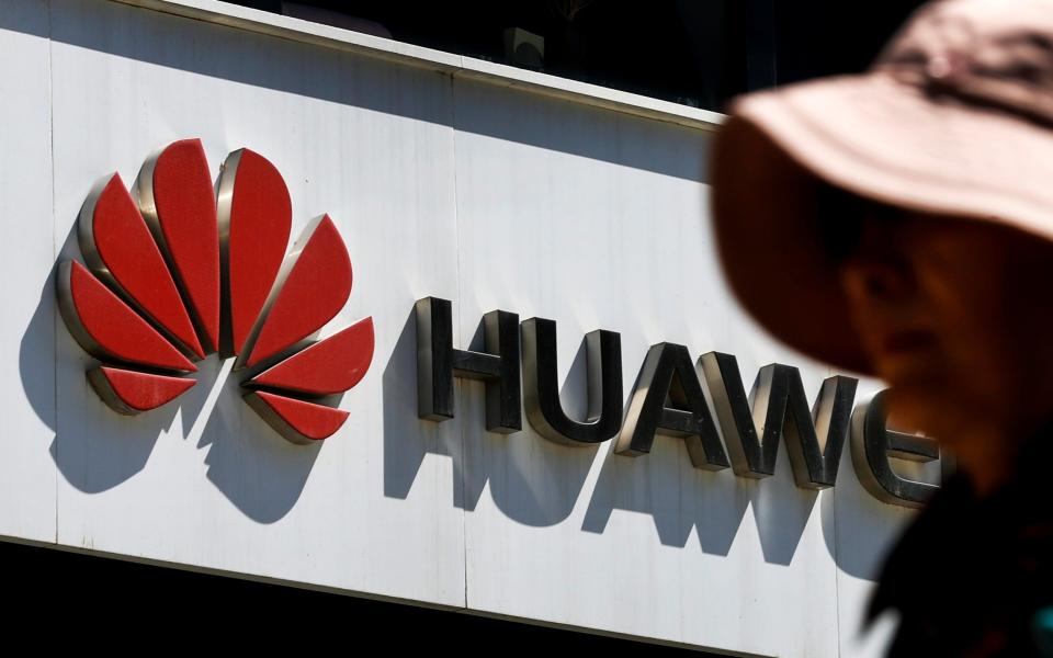 Telecoms operators have reportedly called for a Government meeting to discuss the future of Huawei in Britain - AP