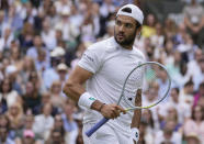 Italy's Matteo Berrettini reacts after winning a point against Serbia's Novak Djokovic during the men's singles final on day thirteen of the Wimbledon Tennis Championships in London, Sunday, July 11, 2021. (AP Photo/Kirsty Wigglesworth)