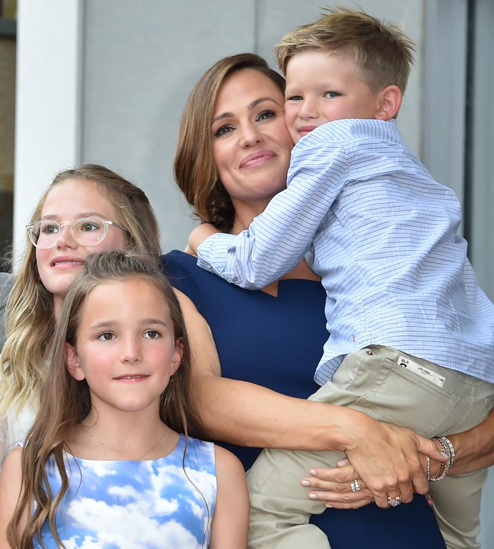 Jennifer Garner poses with her children Violet Affleck, Seraphina Rose Elizabeth Affleck and Samuel Garner Affleck at her star on the Hollywood Walk of Fame, August 20, 2018 in Hollywood, California. (Photo by Robyn Beck/AFP/Getty Images)