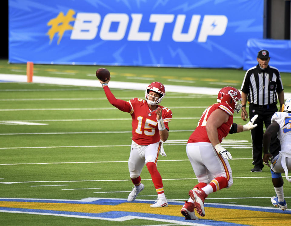 Quarterback Patrick Mahomes of the Kansas City Chiefs passes against the Los Angeles Chargers in the second half of an NFL football game at SoFi Stadium in Inglewood, Calif., on Sunday, Sept. 20, 2020. Kansas City Chiefs won 23-20 in overtime. (Keith Birmingham/The Orange County Register via AP)