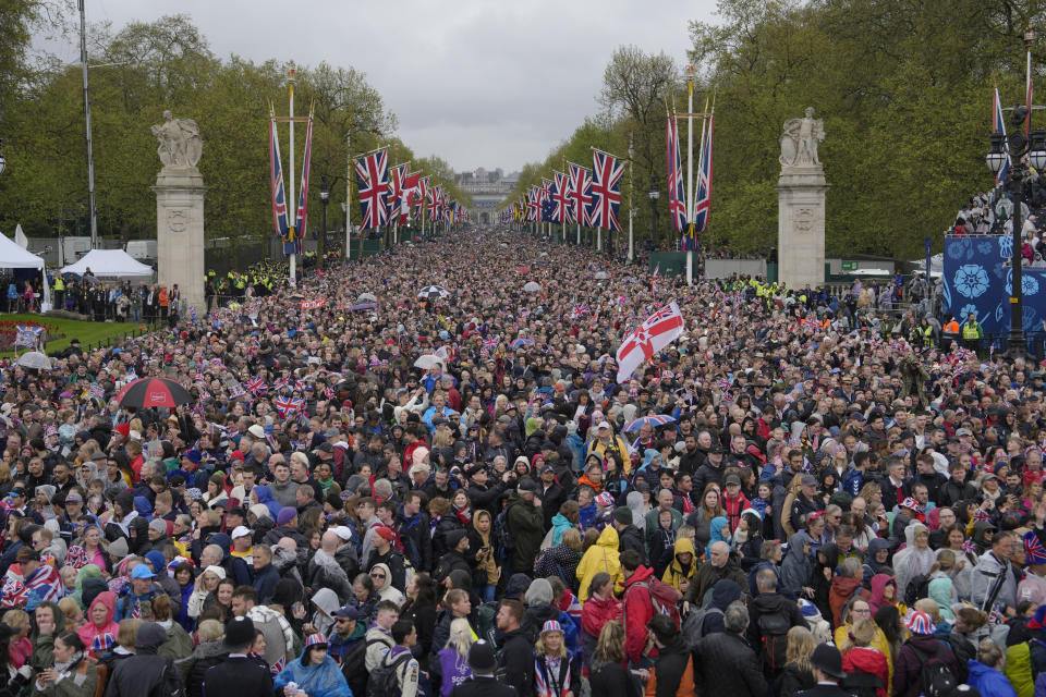 Crowds gather outside Buckingham Palace after the coronation ceremony for Britain's King Charles III in London, Saturday, May 6, 2023. (AP Photo/Vadim Ghirda)